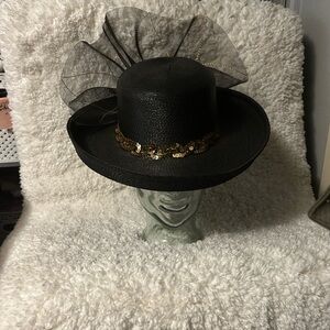 Elegant Black straw Hat with Gold Sequin Band and netting.